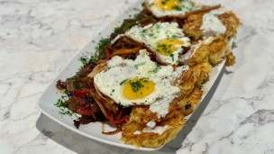 Bife de chorizo con croquetas de papa