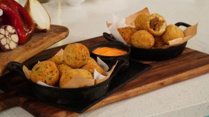 Bomba de papa rellena de carne braseada