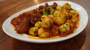 ñoquis rellenos con carne estofada
