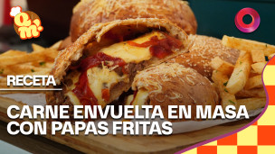 carne envuelta en masa con papas fritas
